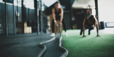 two person inside gym exercising